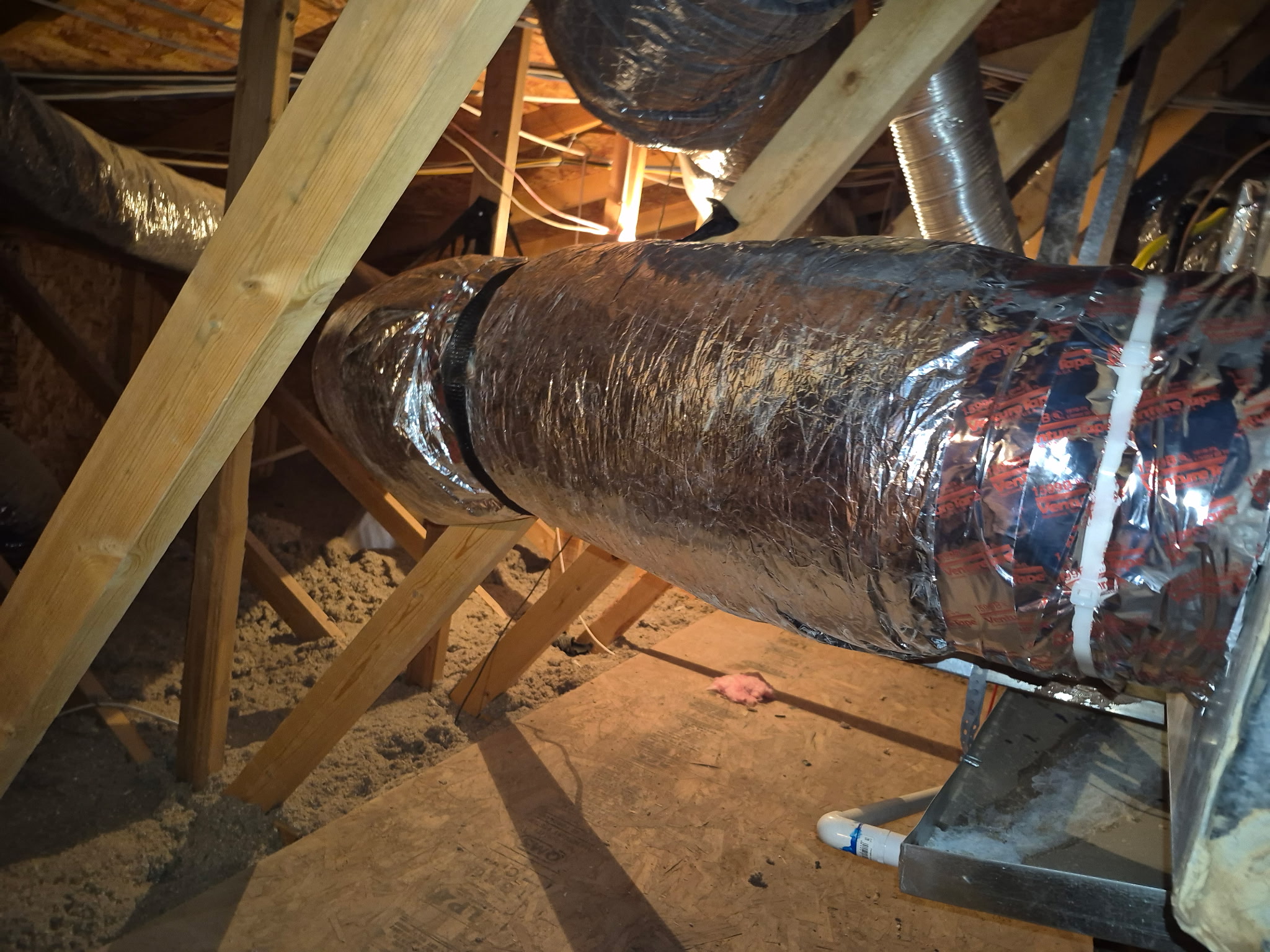 Insulated flexible ductwork in a residential attic